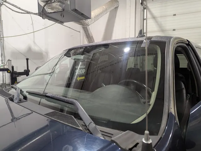A replacement windshield installed at The Windshield Shop